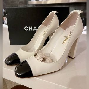 Chanel white and black pumps
